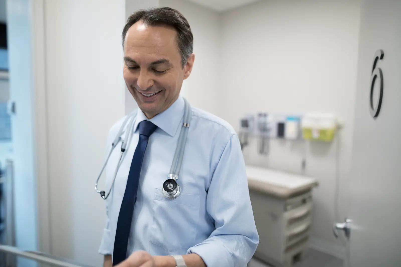 Healthcare accountant meeting with a physician about practice finances