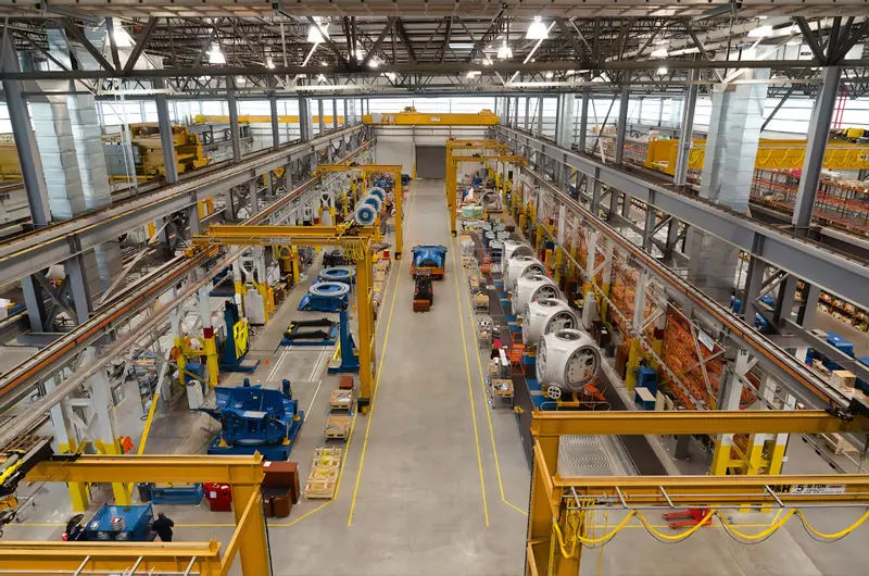 Accountant reviewing inventory in a manufacturing and distribution facility